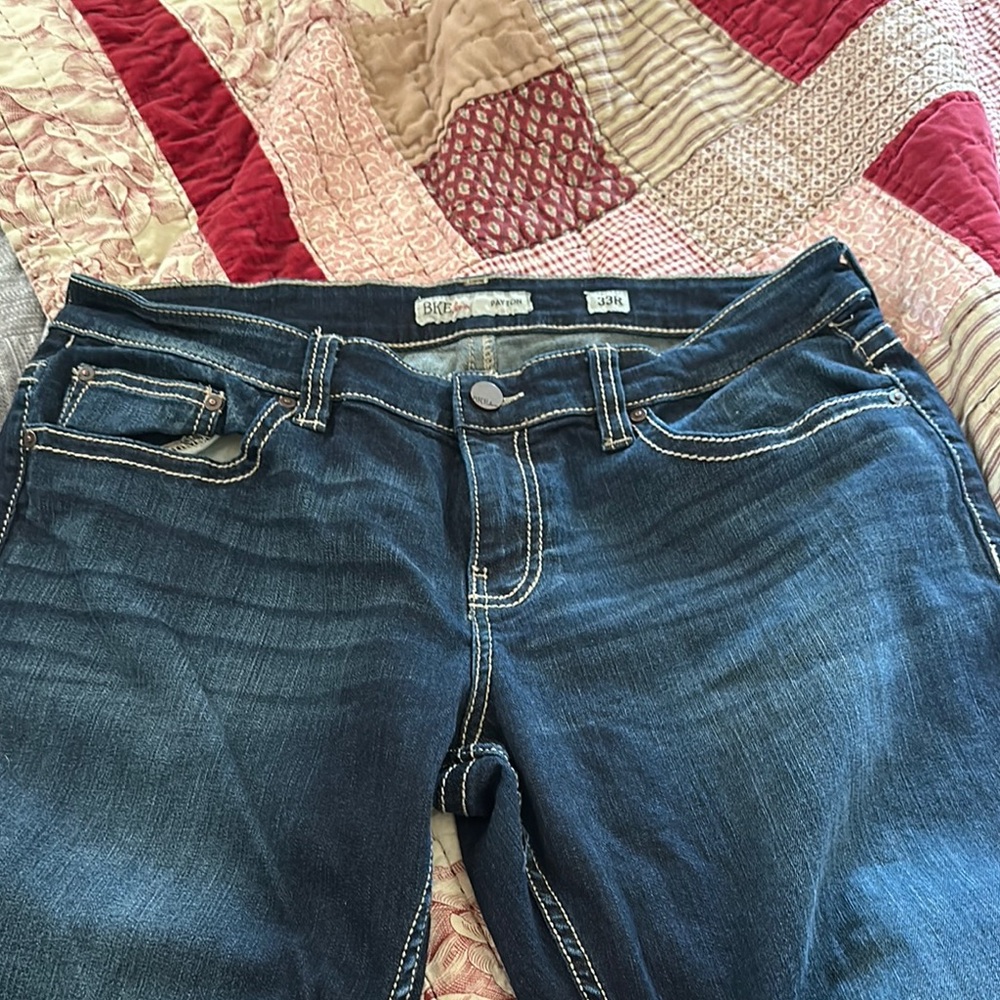 BKE Blue Boot Cut Jeans with Medium to Dark Wash and Classic Styling